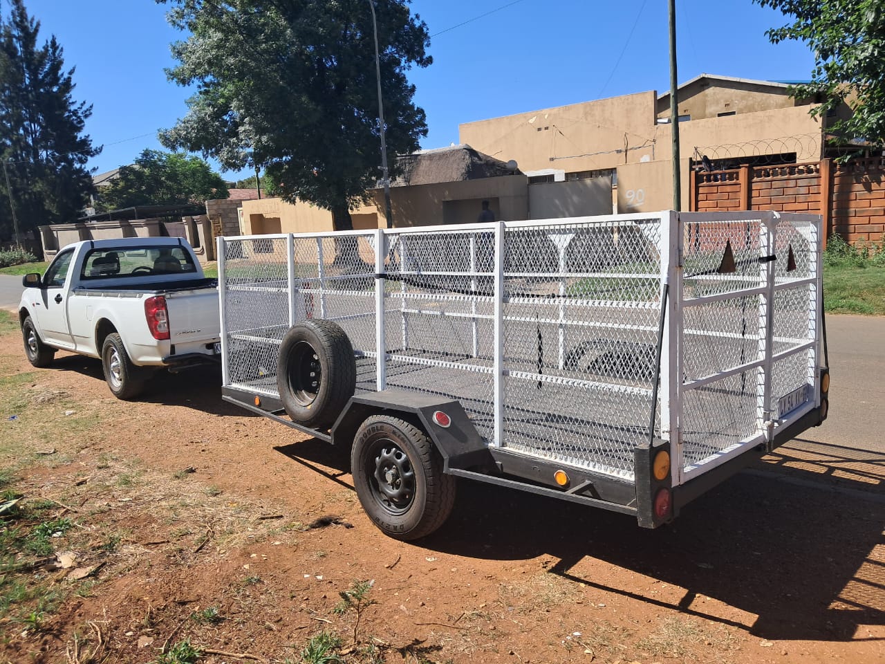 Bakkie with mesh trailer ready for transport