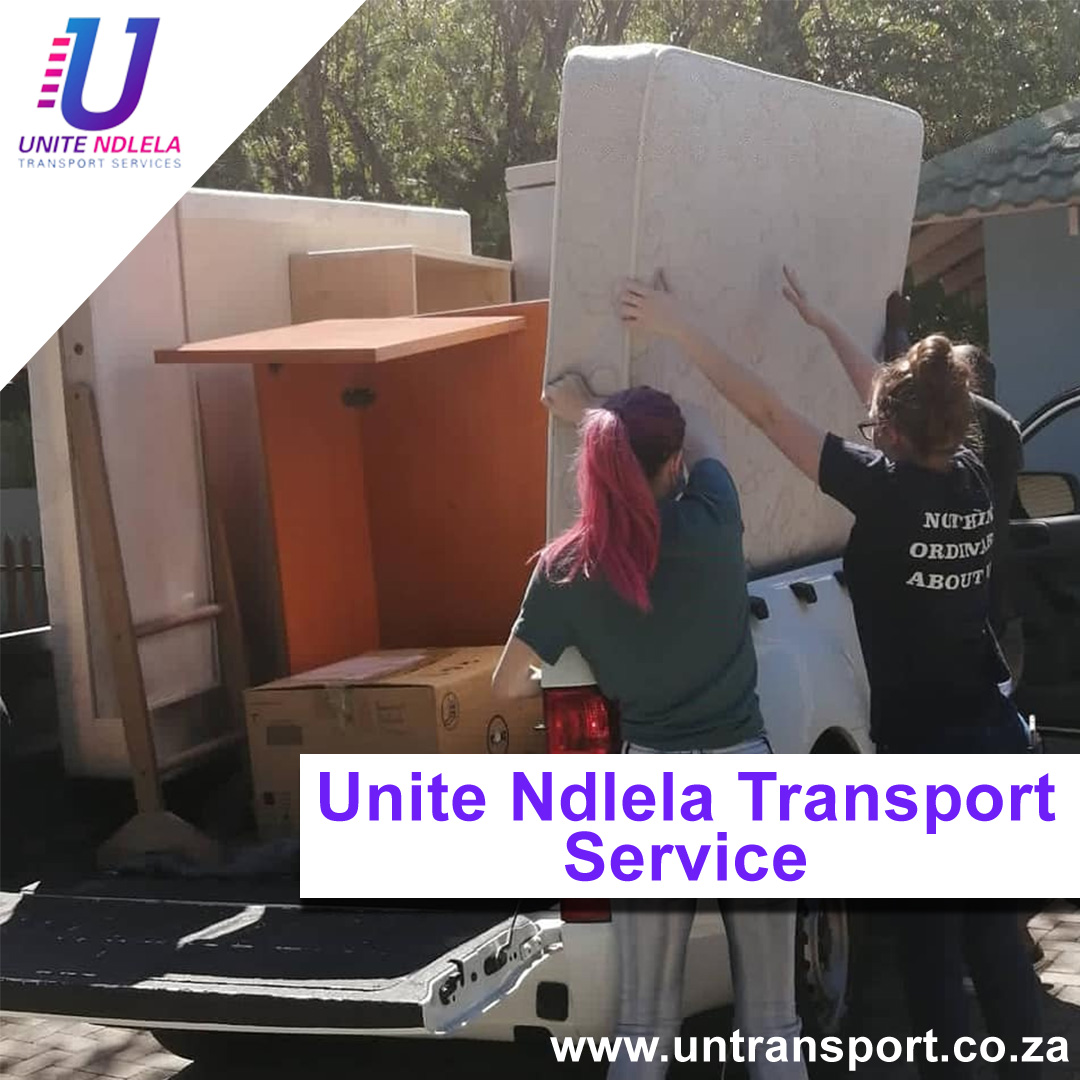 Team loading household furniture and mattress